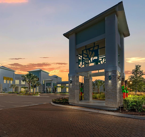 Exterior view of a modern living complex, ideal for implementing scalable access control solutions during development