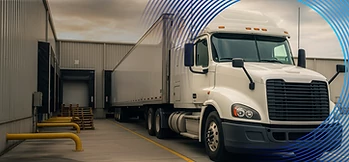 Driver standing near trucks in yard