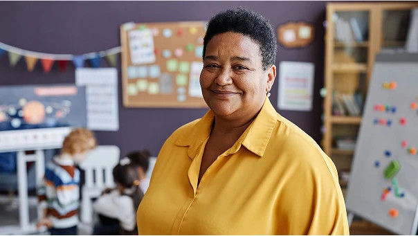 Female school administrator, representing facility operations and secure access control in educational environments