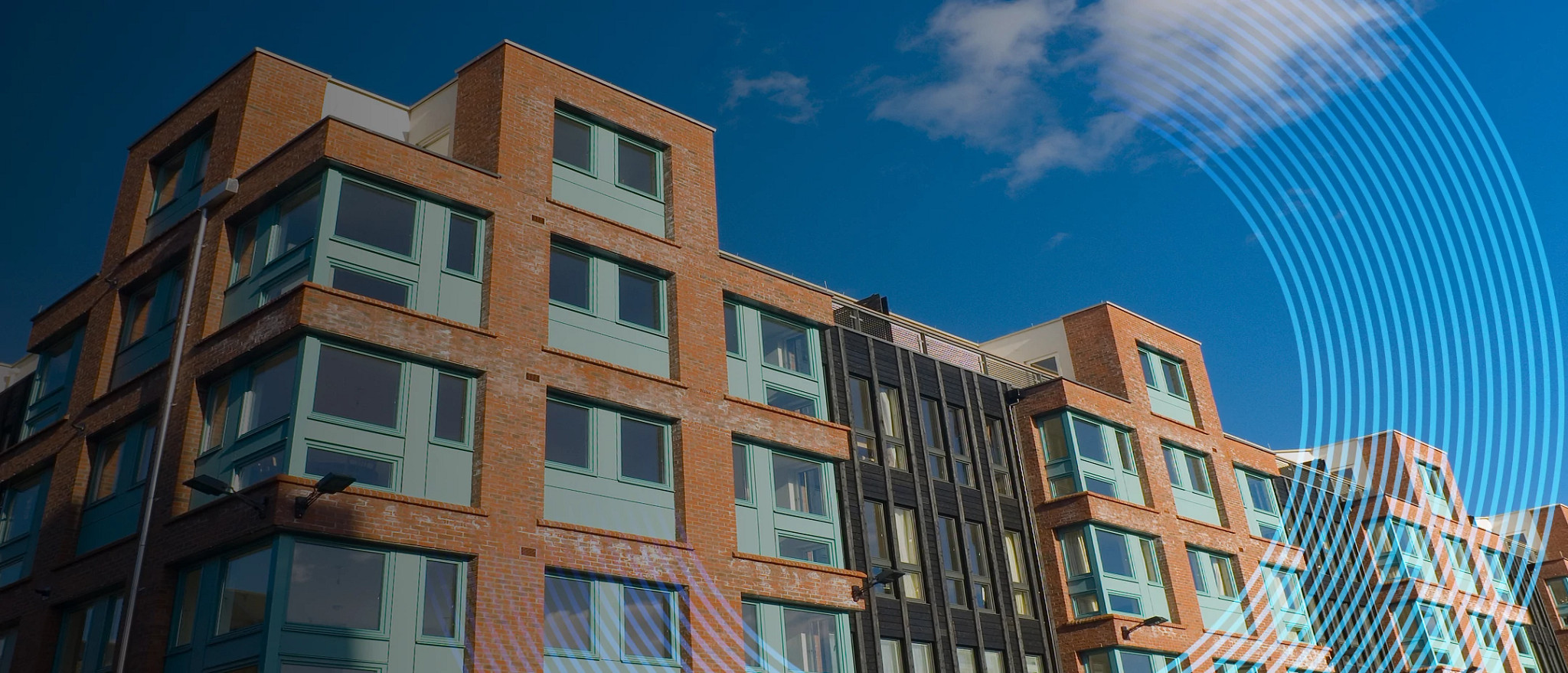 Exterior view of student housing facility, illustrating smart access control for multifamily communities